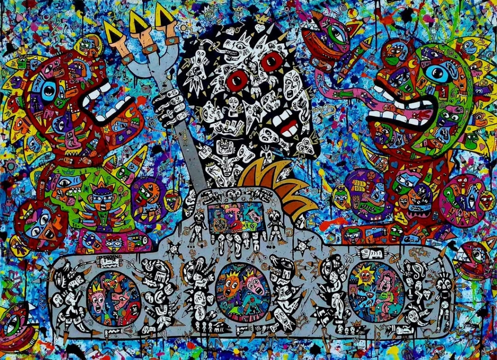 Mobilis in mobile de Jean-Marc Calvet, acrylique sur toile originale de trois visages stylisés composés de personnages, symboles et créatures colorées. Sur un fond bleu éclaboussé de projections de peinture, l'œuvre célèbre la musique, l'imaginaire et l'énergie créatrice caractéristiques de l'univers de l'artiste.