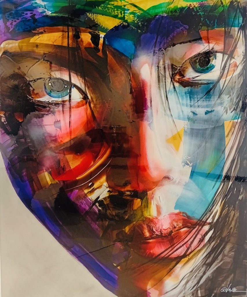 Peinture sur aluminium de Fabiola Govare intitulée décider représentant un visage androgyne abstrait avec beaucoup de couleurs