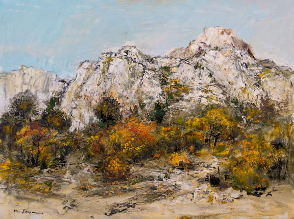 Peinture en huile sur toile intitulée ROCHES BLANCHES DANS LES ALPILLES de Michel JOUENNE, cette composition figurative est la représentation du massif montagneux des Alpilles en Provence avec un chemin sinueux et de la végétation dans le centre de la toile