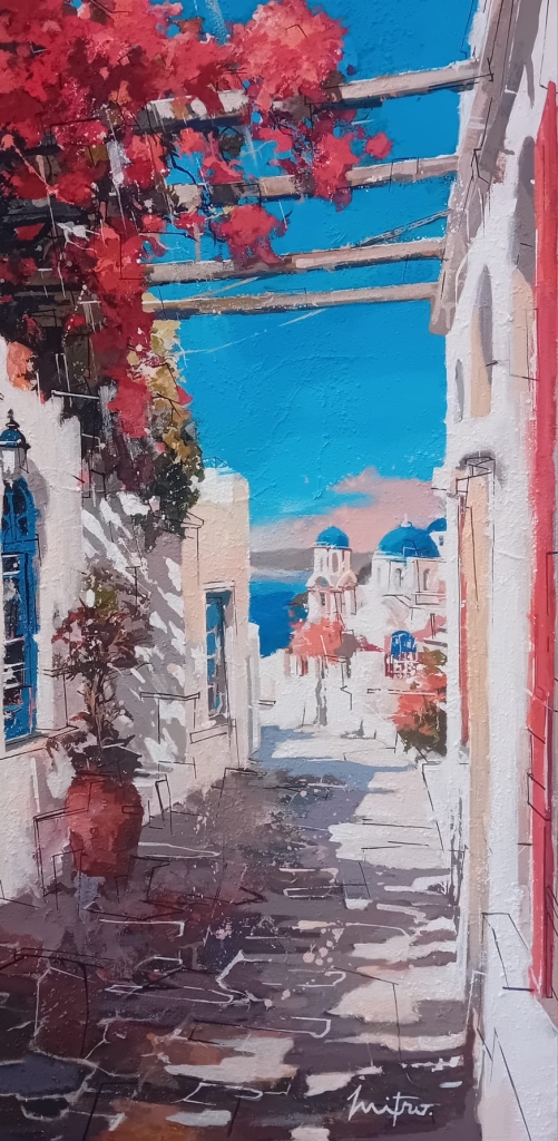 Peinture en acrylique sur toile de Mitro représentant une petite ruelle dans une ville Grecque reconnaissable grace à ces facades blanche, les toits bleus, les fleurs rouges et le sol pavé de pierres. Le ciel est d'un bleu azur très lumineux